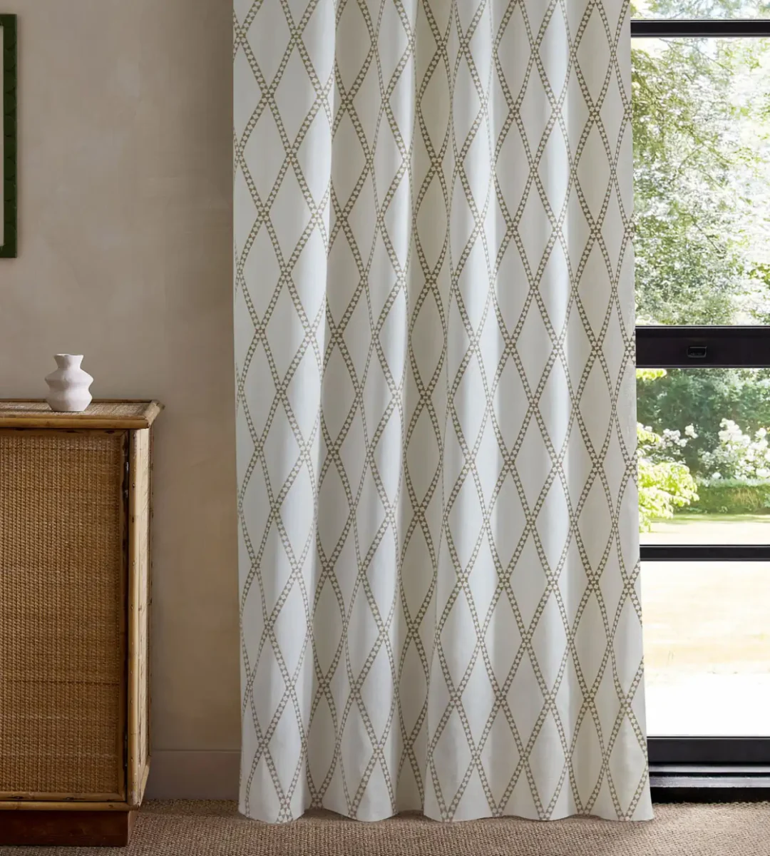 neutral geometric curtain with cabinets and window
