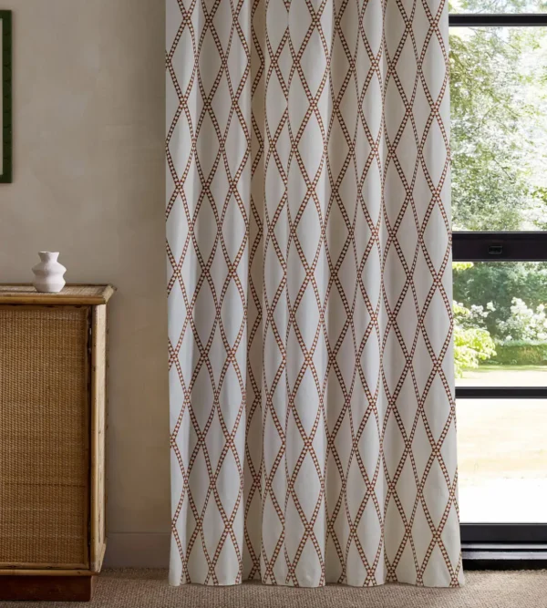 Hayloft Embroidery Fabric - Tomato by red geometric curtain with cabinets and window