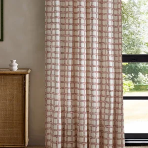 red checked curtain with cabinets and window