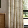 yellow checked curtain with cabinets and window