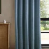 blue misc curtain with cabinets and window