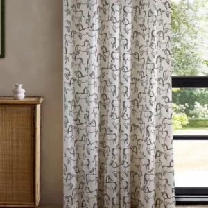 brown animal curtain with cabinets and window