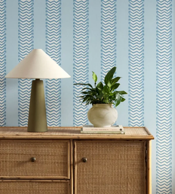 Bradgate Wallpaper - Coast Blue by blue striped wallpaper and wall with cabinets and vases