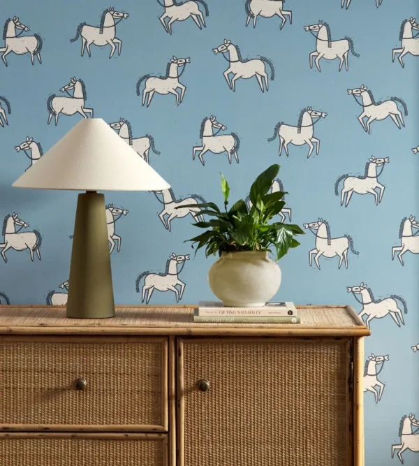 Canter Wallpaper - Denim by blue animal wallpaper and wall with cabinets and vases