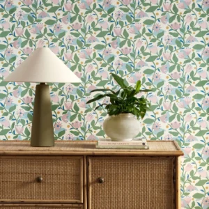 green botanical wallpaper and wall with cabinets and vases