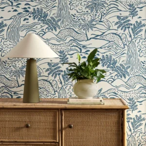 blue botanical wallpaper and wall with cabinets and vases