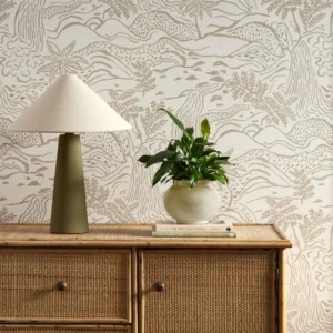 neutral botanical wallpaper and wall with cabinets and vases