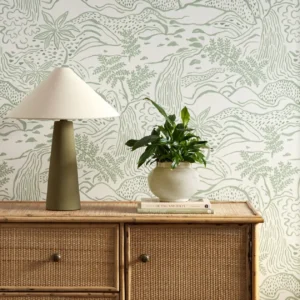 green botanical wallpaper and wall with cabinets and vases