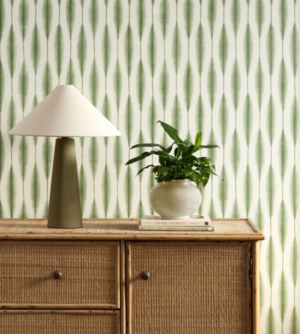 Kasuri Wallpaper - Pine by green striped wallpaper and wall with cabinets and vases