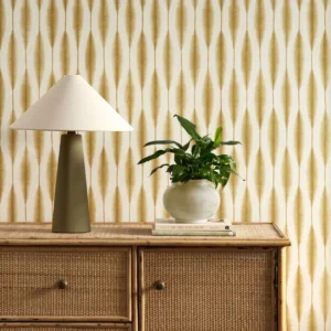 yellow striped wallpaper and wall with cabinets and vases