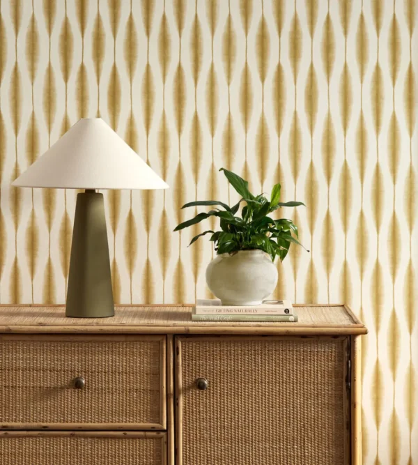 Kasuri Wallpaper - Barley by yellow striped wallpaper and wall with cabinets and vases