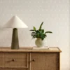 neutral misc wallpaper and wall with cabinets and vases
