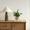 blue misc wallpaper and wall with cabinets and vases
