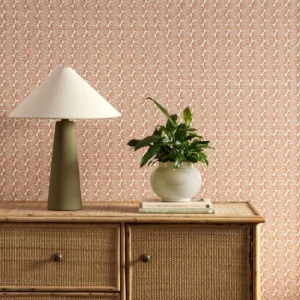 orange striped wallpaper and wall with cabinets and vases