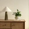 yellow misc wallpaper and wall with cabinets and vases