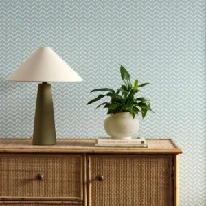 blue misc wallpaper and wall with cabinets and vases