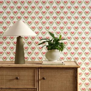 red botanical wallpaper and wall with cabinets and vases