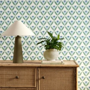 green botanical wallpaper and wall with cabinets and vases