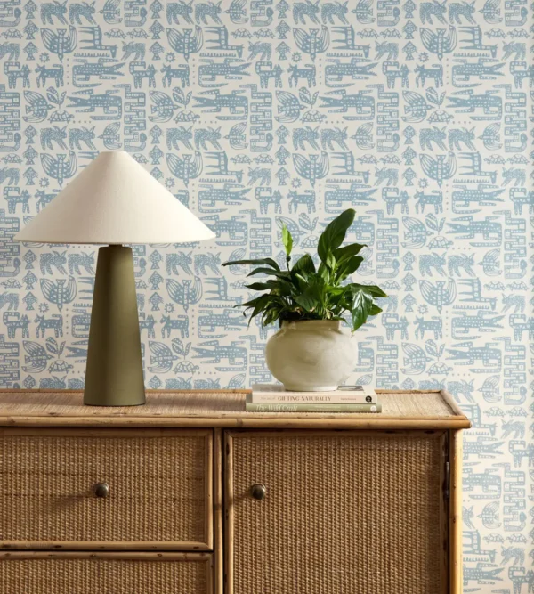blue misc wallpaper and wall with cabinets and vases