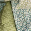 blue botanical sofa with cushion