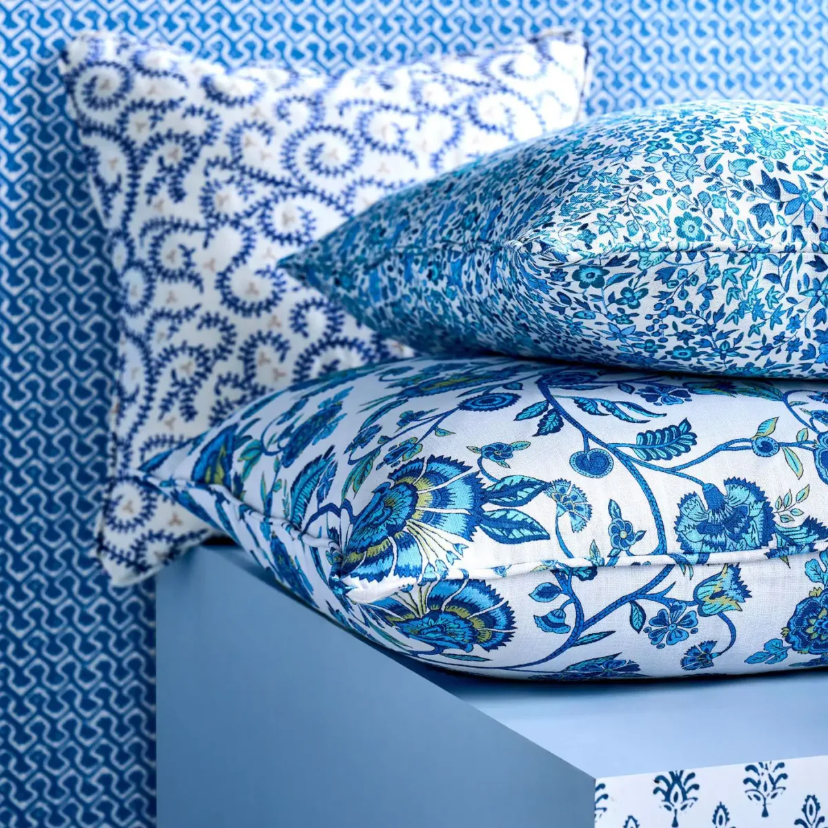 Buta Fabric - Cobalt by black-grey botanical cushion with wall
