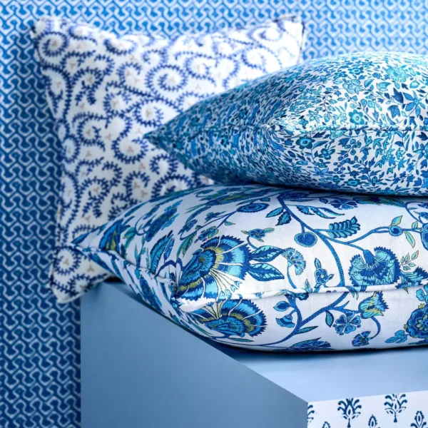 Hathi Fabric - Cobalt by black-grey botanical cushion with wall