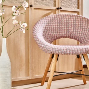 purple misc armchair with vases and cabinets
