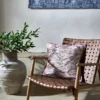 red misc wall with cushion and chair