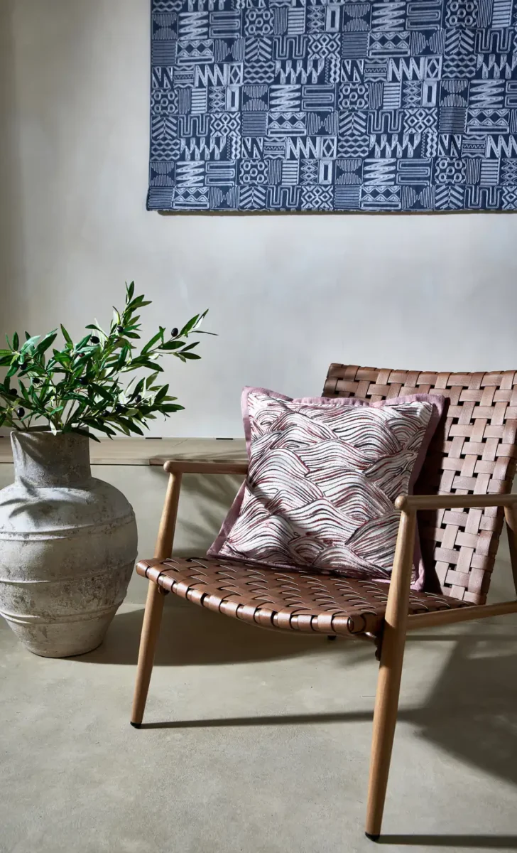red misc wall with cushion and chair