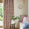 purple misc curtain with cushion and vases
