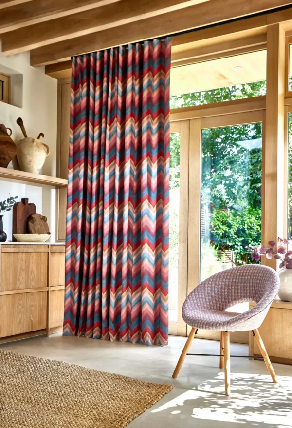 Zendaya Fabric - Cactus by orange geometric curtain with armchair and cabinets