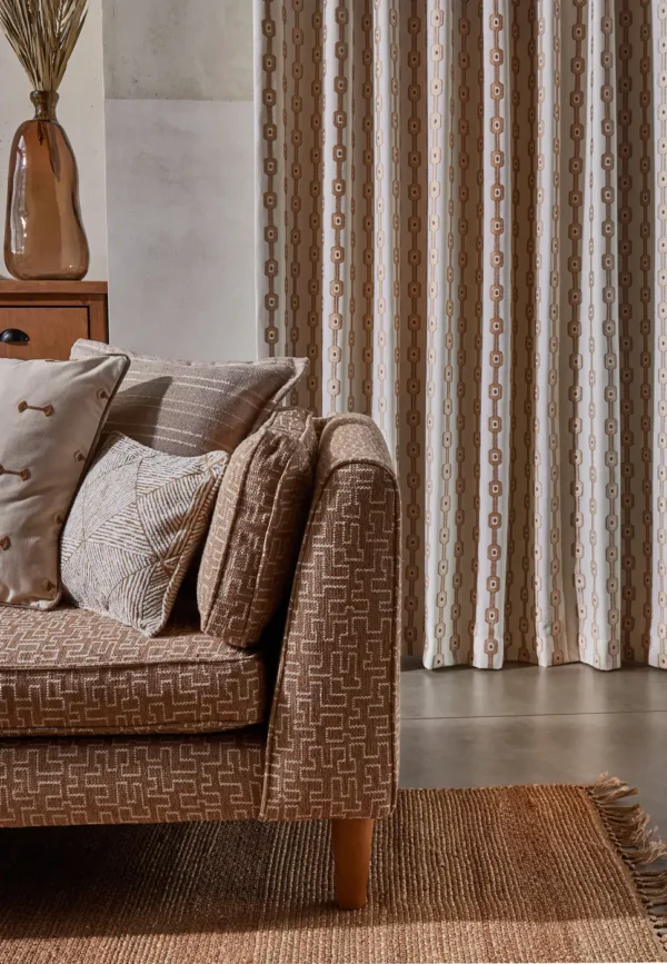 Harlow Fabric - Butterscotch by neutral striped curtain with cushion and sofa
