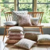 blue botanical cushion with cushion and window