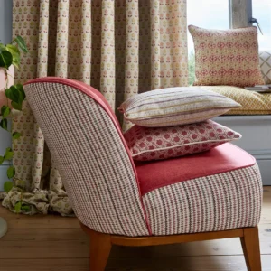 brown striped armchair with cushion and curtain