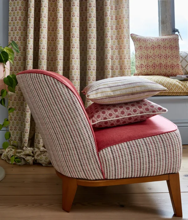 Alwin Fabric - Cucumber by brown striped armchair with cushion and curtain