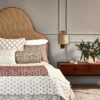 yellow misc bed with cushion and vases