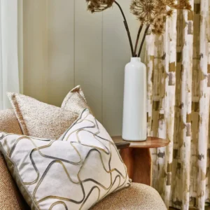 yellow misc cushion with curtain and vases