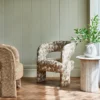 brown contemporary armchair with plants and vases