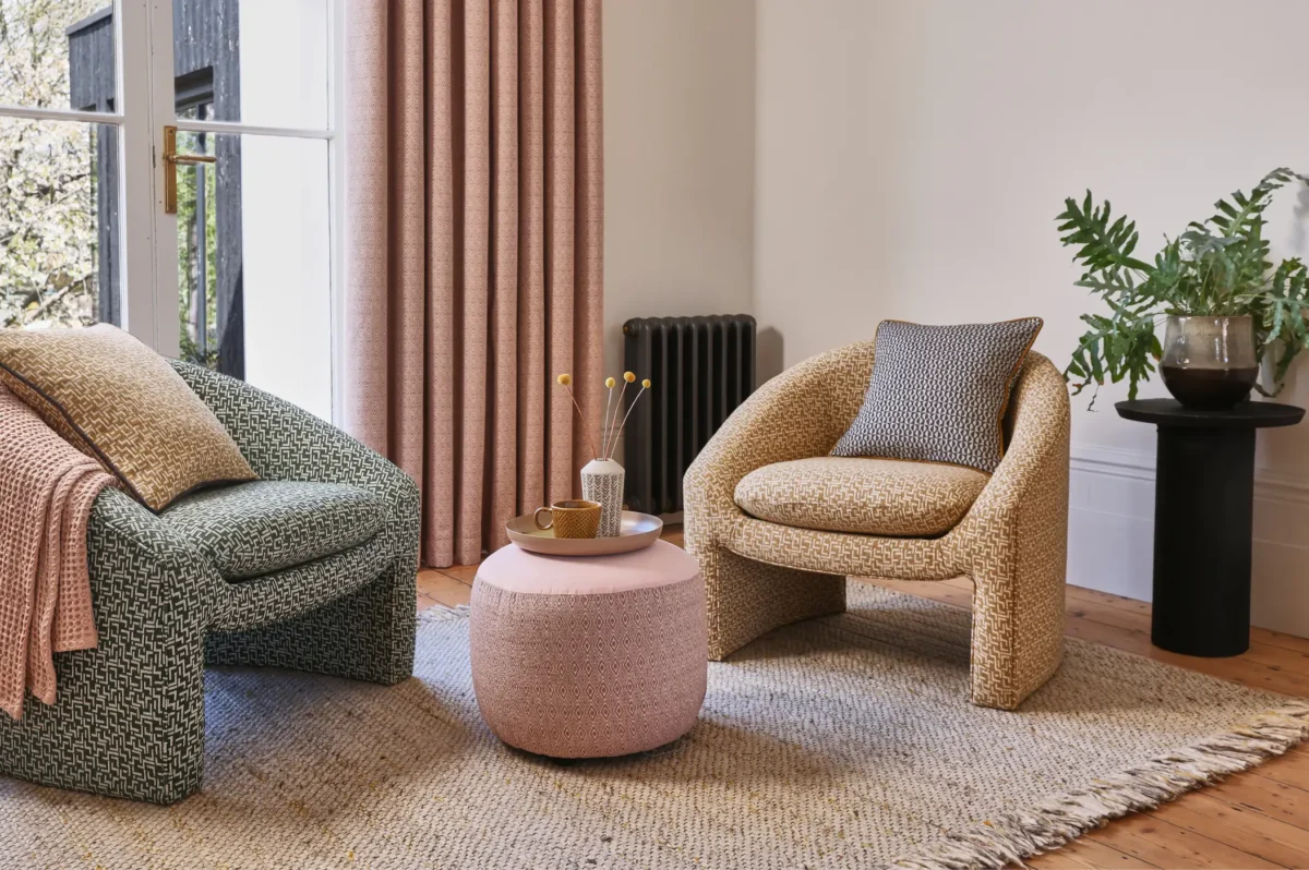 Brixton Fabric - Lunar by neutral geometric armchair with curtain and vases