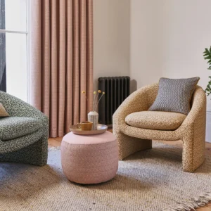 neutral geometric armchair with curtain and vases