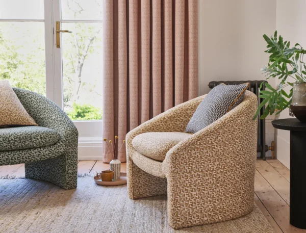 Shoreditch Fabric - Ecru by neutral geometric armchair with curtain and vases
