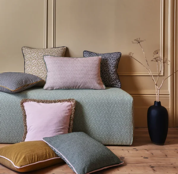 Hackney Fabric - Jet by neutral geometric sofa with cushion and vases