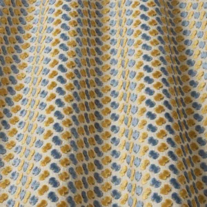 yellow spotted fabric with