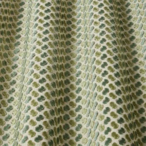 green spotted fabric with