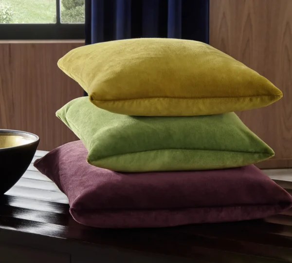Hampton Fabric - Papaya by brown plain cushion with curtain and vases