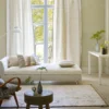 blue misc curtain with cushion and bed