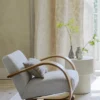 white misc curtain with armchair and vases