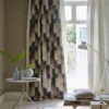 brown checked curtain with cushion and side table