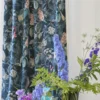 blue botanical curtain with vases