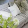 multicolour striped sofa with cushion
